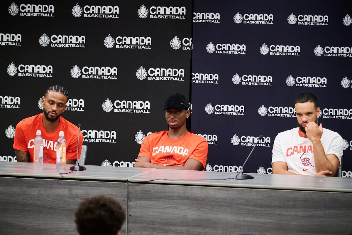 Nickeil Alexander-Walker, left to right, Shai Gilgeous-Alexander and Dillon Brooks speak to media at the training camp roster announcement for the FIBA men’s World Cup Americas qualifiers in Toronto on Monday.Sammy Kogan/The Canadian Press