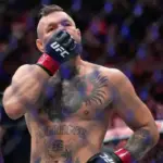 McGregor injures leg on opening kick vs. Holloway at UFC 329