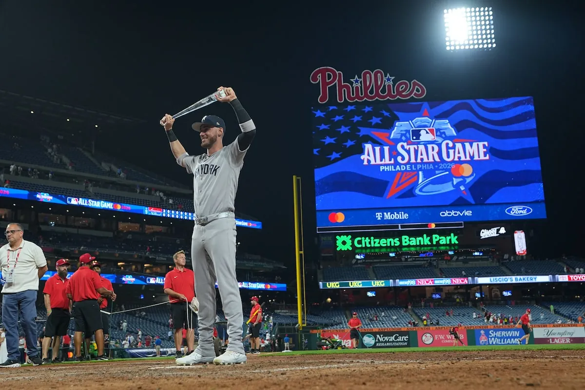 New York Yankees' Cody Bellinger poses with the MVP trophy.Matt Rourke/The Associated Press