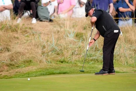 Darren Clarke putts